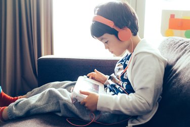 Young boy playing a computer game