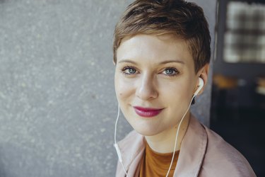 Portrait of woman with earphones