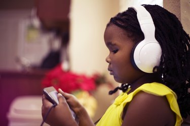 Little Girl Wearing Headphones