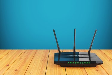 Wi-Fi wireless router on wooden table