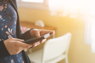 Woman using her mobile phone