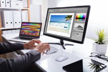 Designer Editing Photo On Computer
