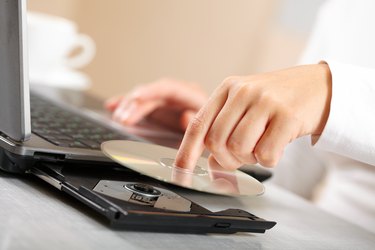 Woman hand with CD