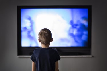 Little boy watching TV