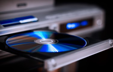 DVD disc inserting to player