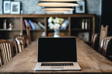 Laptop on a table in a cafe