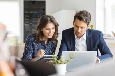 Business people working together at coffee shop