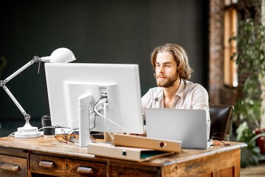 Man working with computer indoors