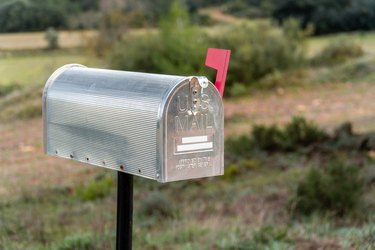 Classic style metal USA mailbox outdoors
