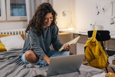 female student in dorm room