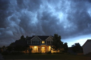 House in bad summer thunderstorm