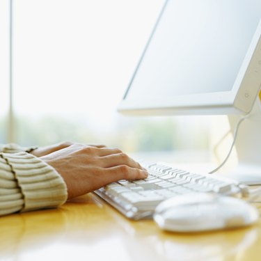 close-up of a person using a computer