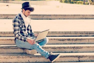 boy working on his laptop