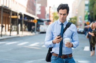 Man texting on phone