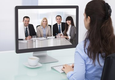 Businesswoman Watching Video Conference
