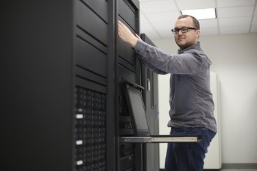 Technician working on a server