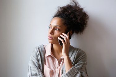 Young woman talking on mobile phone