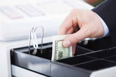 Hand With Dollar Notes