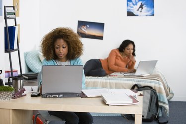 Women using laptop computers