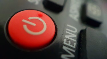 Close-Up Of A Red Standby Button