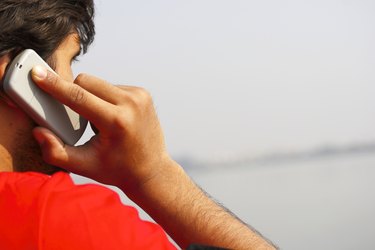 Close up shot of a man talking on cell phone