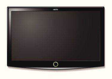 Black LCD tv screen hanging on a wall with shadow