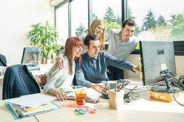 Young business people employee with computer at start up improvement