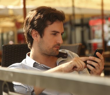 Young man using smart phone