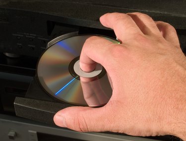 inserting dvd disk in player
