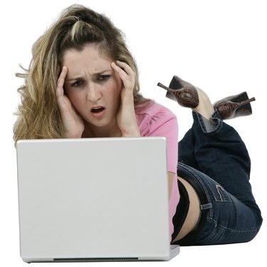 Frustrated Woman Using Computer