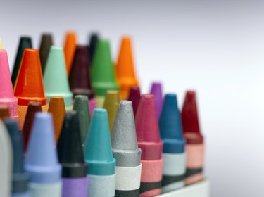 Rows of colourful crayons, close-up