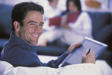 Man using tablet computer