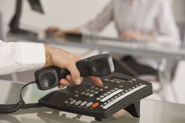 Man using telephone