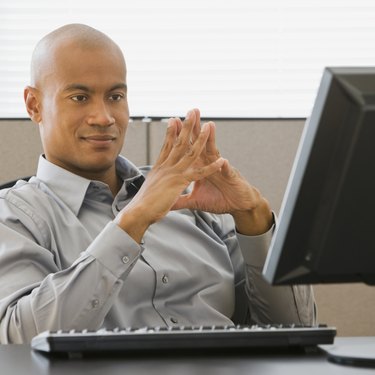 African businessman looking at computer