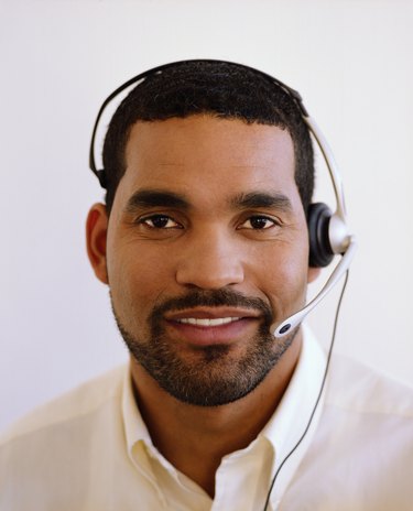 Man wearing telephone headset