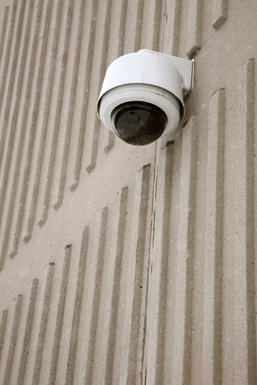 Close-up of security camera on exterior of building