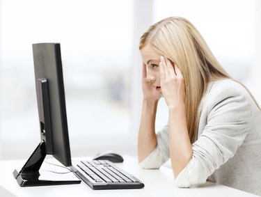 stressed woman with computer