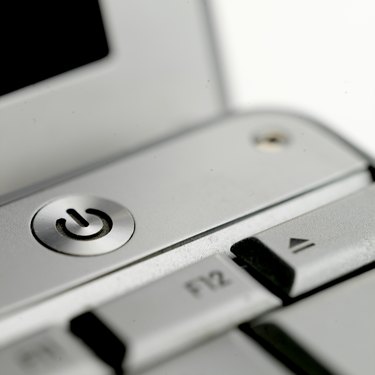 'Power on' button on laptop, close up