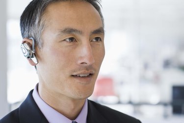 Businessman with earpiece