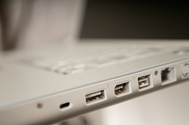Ports along edge of laptop computer