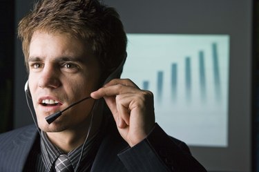 Stock market businessman with headset