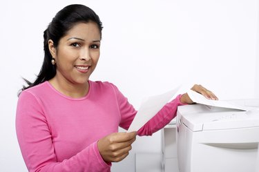 Woman next to a printer