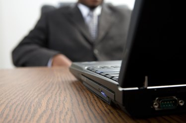 Laptop computer and man in office