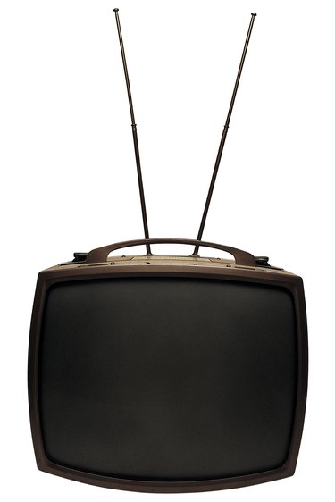 Old-fashioned television with antenna