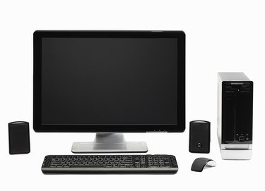 Computer with flat screen keyboard, speakers, mous