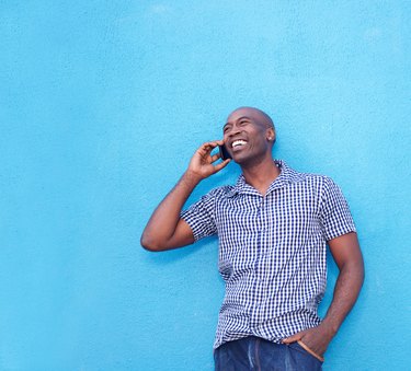 Modern african man talking on cell phone