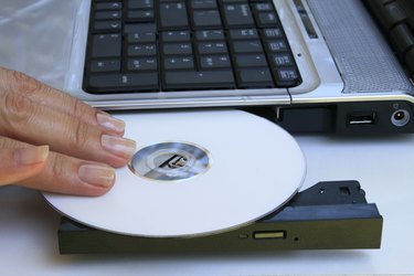 Hand on the CD Drive