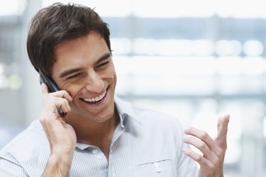 Young handsome guy enjoying a telephonic conversation