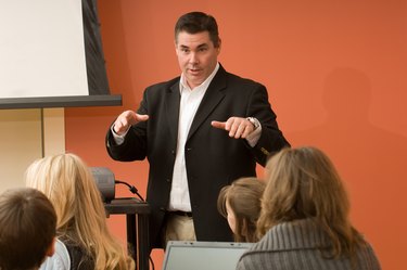 Teacher making presentation to class