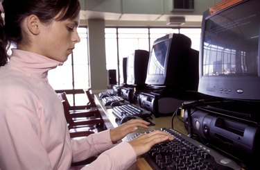 Girl doing schoolwork on computer